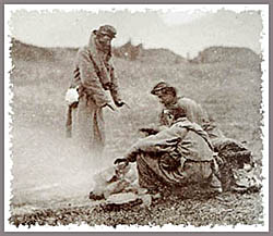 Confederate pickets gather round the fire.